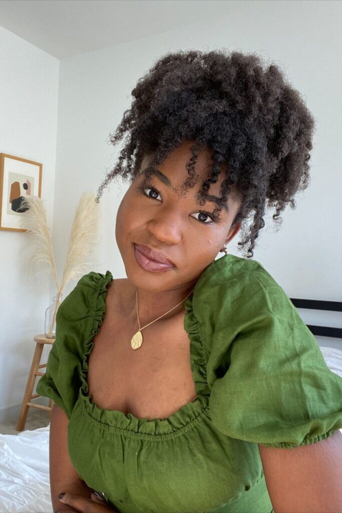 someone with twist out with bangs