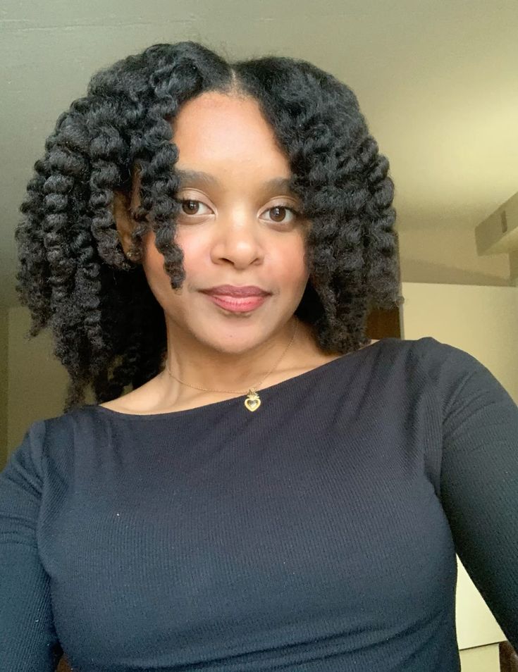 someone with twist out with middle part for every hair length