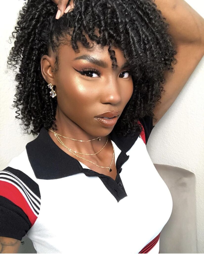 someone with twist out with straws