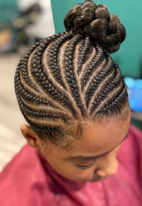 someone with twisted side bun