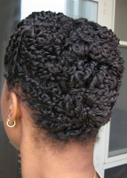 someone with twisted updo with pins