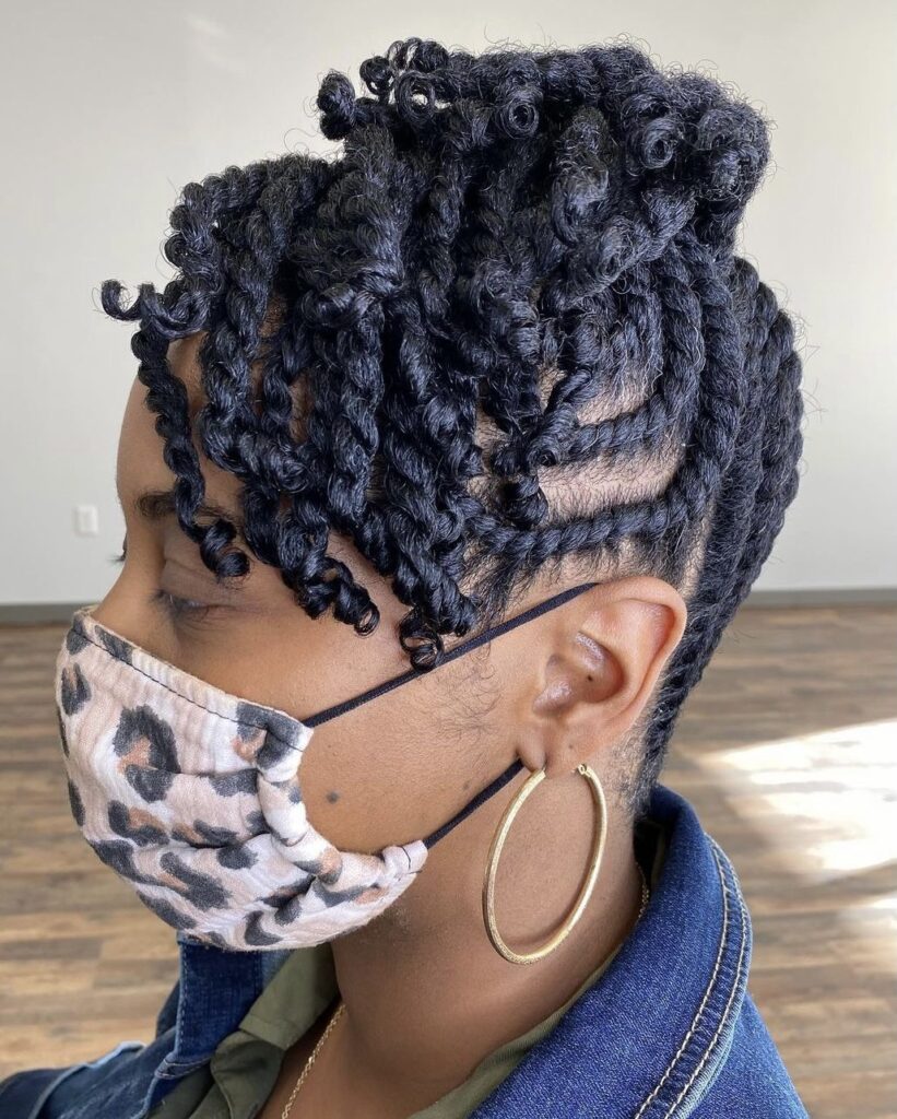 someone with two strand twist updo