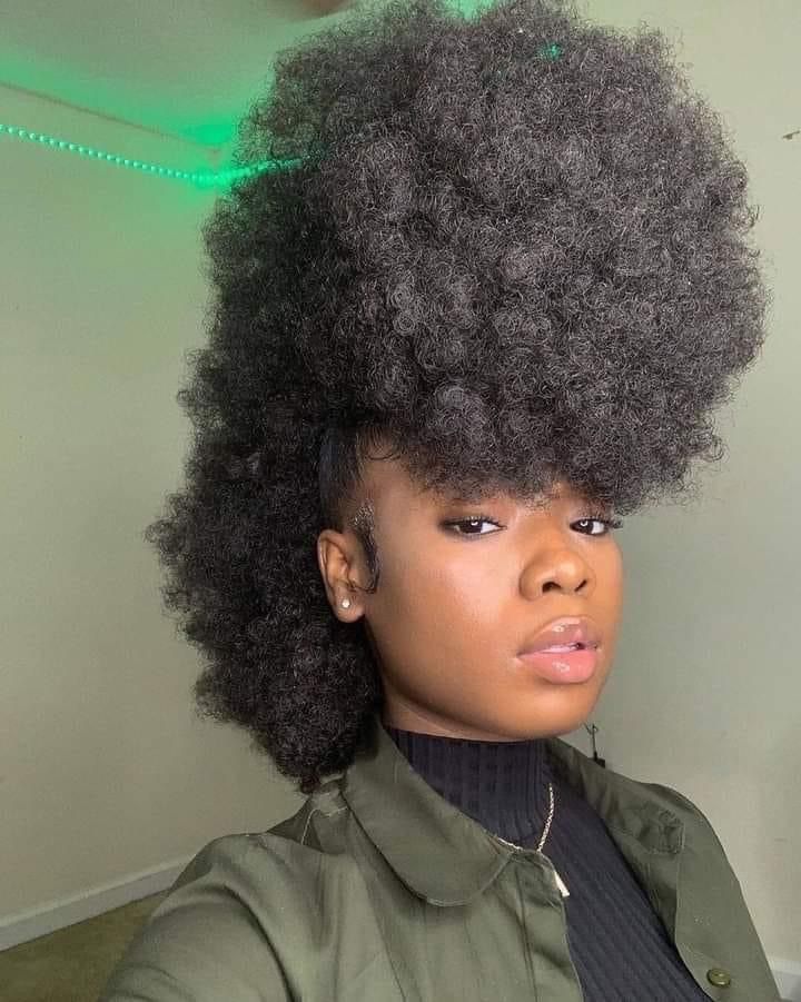 someone with voluminous frohawk with defined end