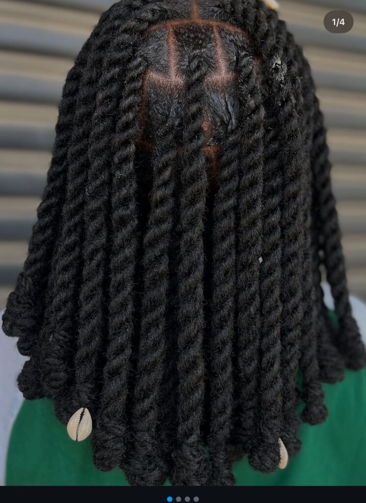 someone with yarn twists