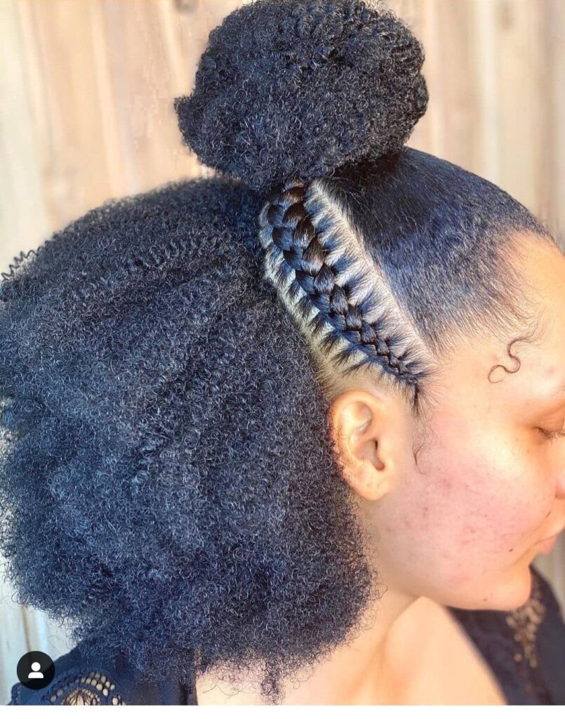 a girl with well styled afro hair