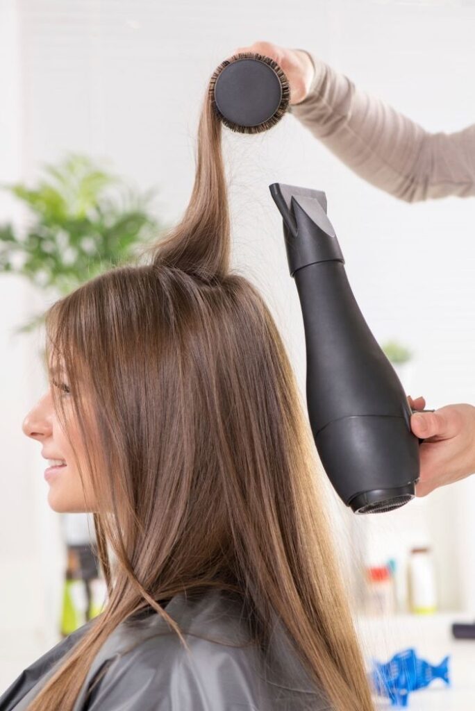 someone air drying her hair