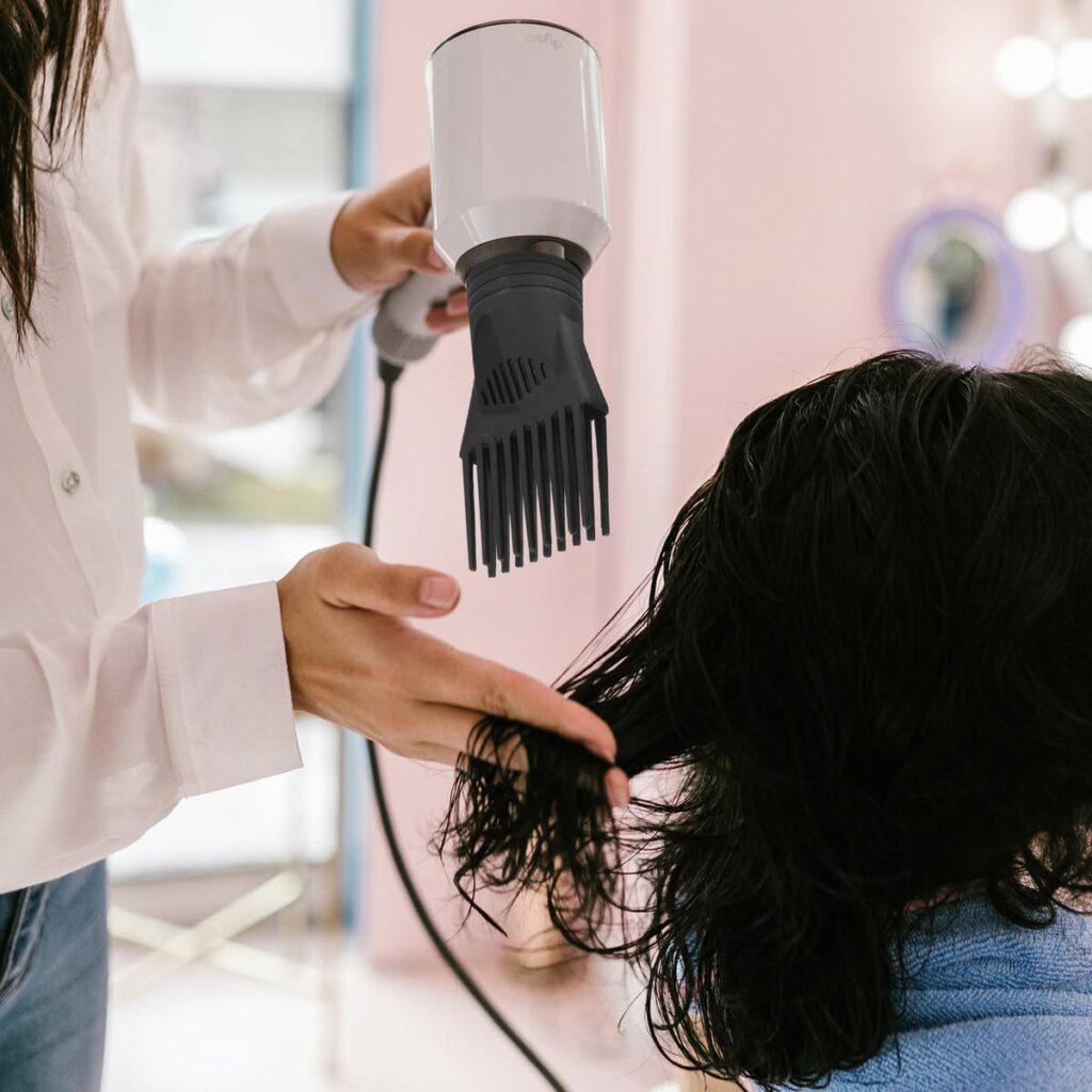 someone drying her hair