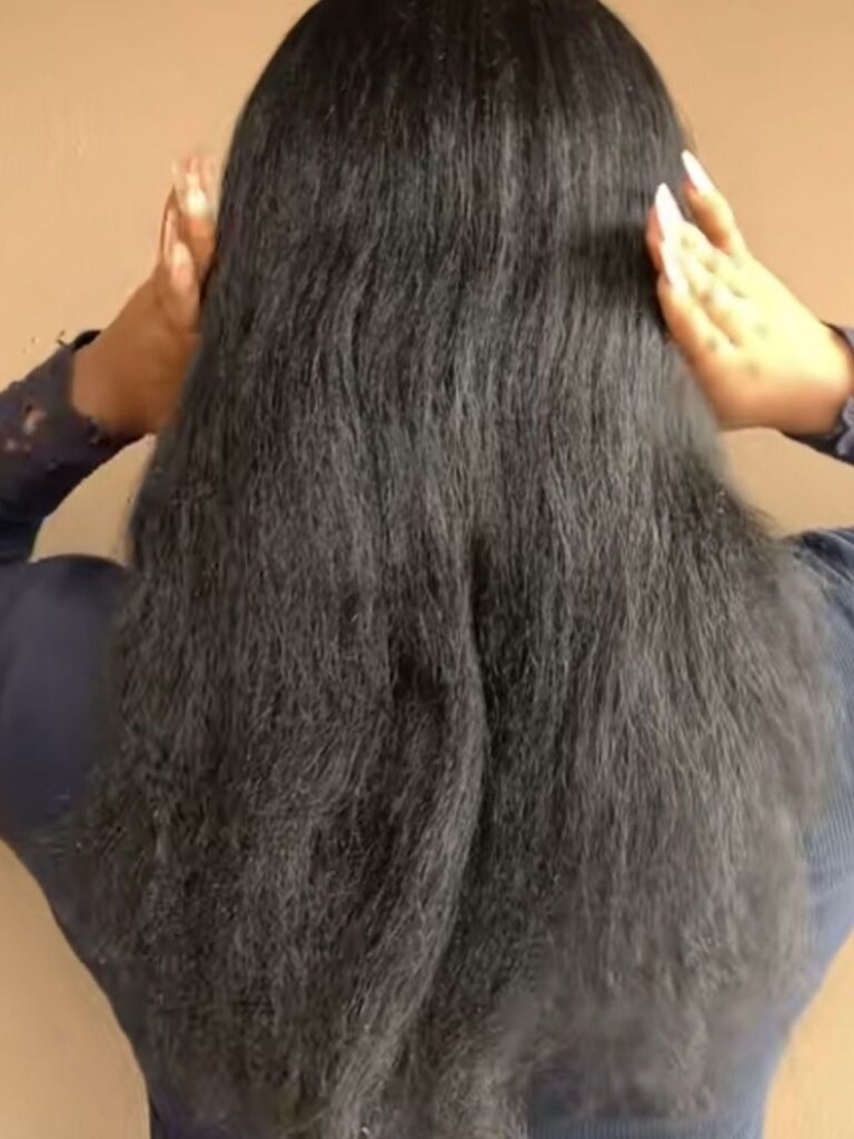 someone showing her blow dry hair