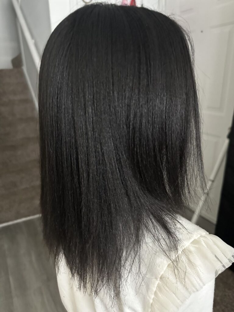 someone with blow out hair