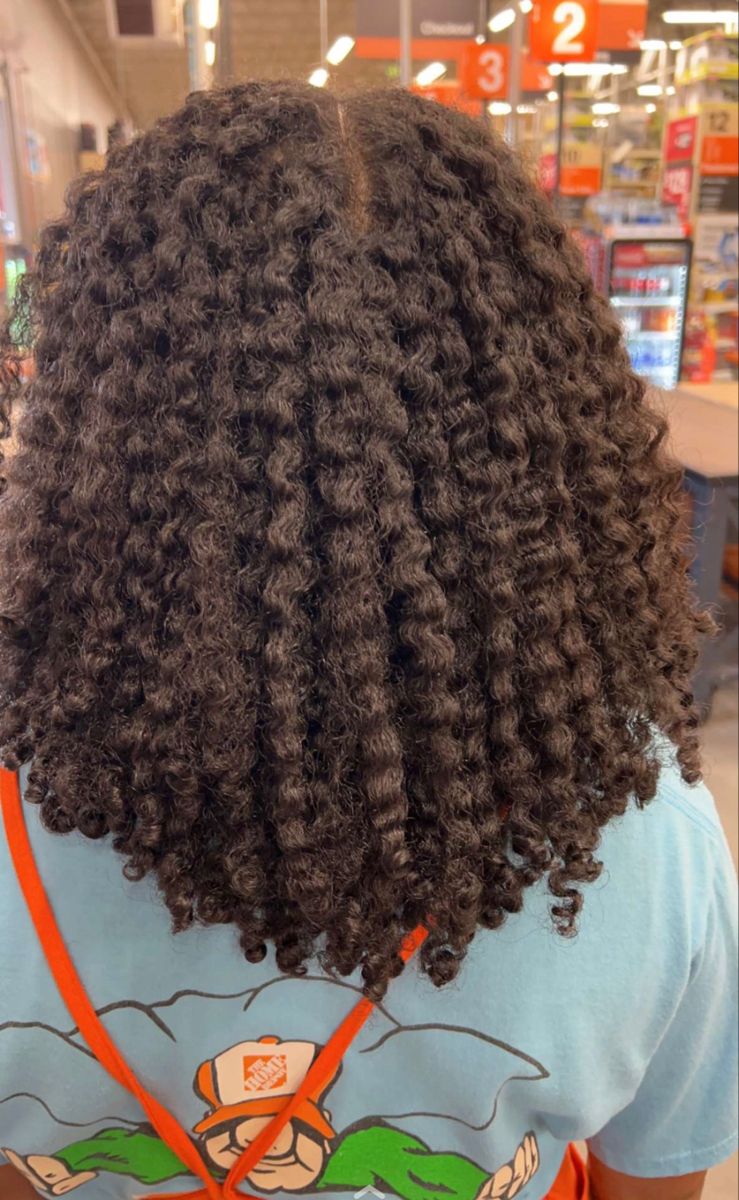 someone with braid out styles