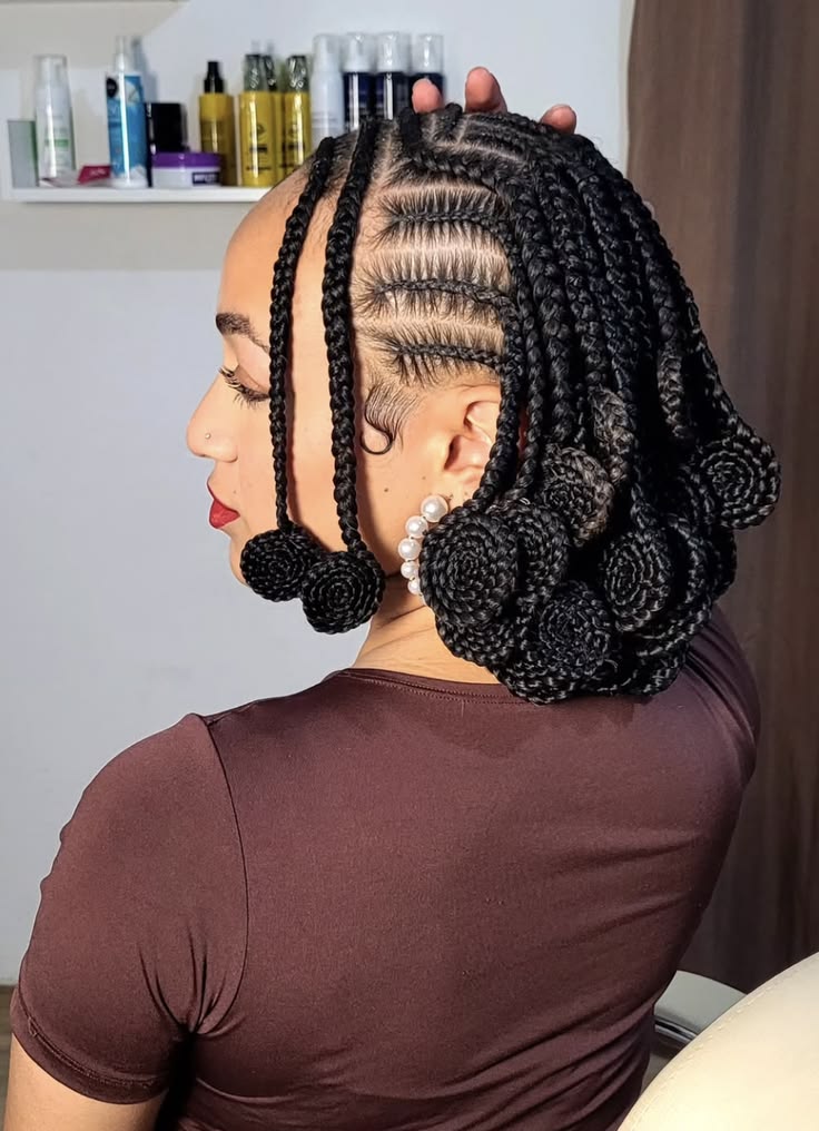 someone with cornrows as protective styles for length retention