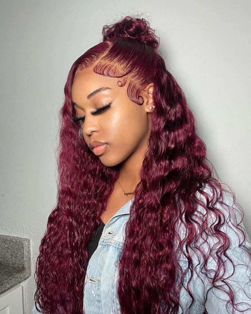 someone with a colored long curly wig