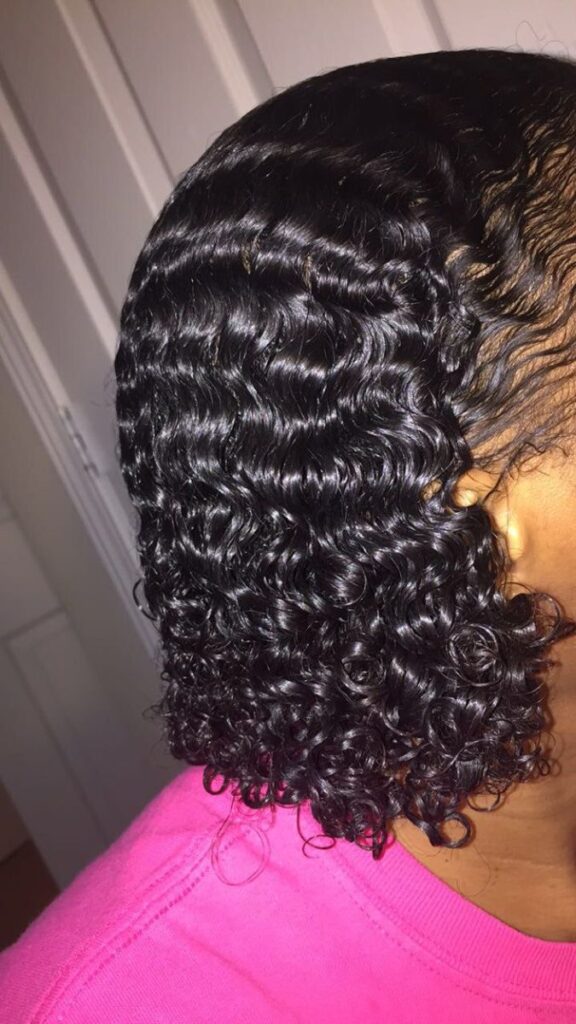 someone with curly hair