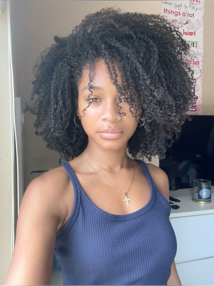 someone with a curly hair