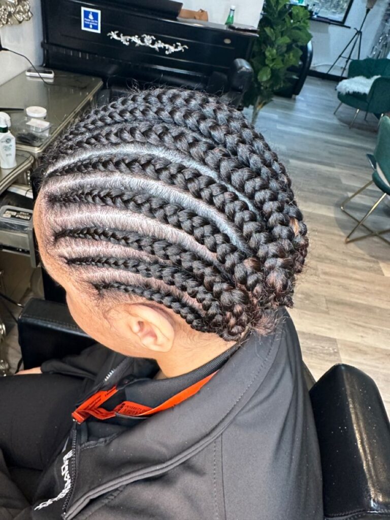 someone with flat twist protective style as a way to prep hair before installing wig