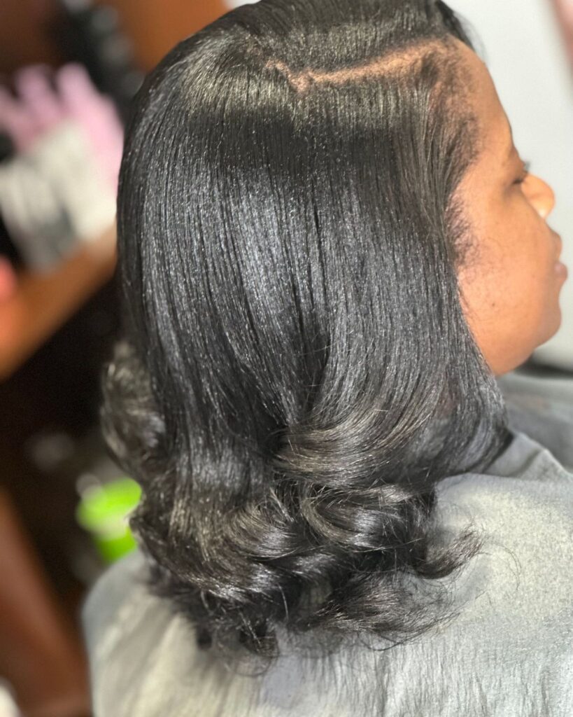 someone with a silk press hair