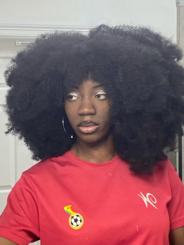 a girl with full natural hair