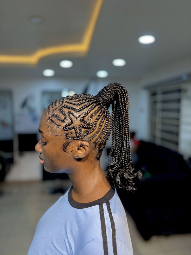 someone with Ghana braid down as hairstyle that could be damaging your hairline