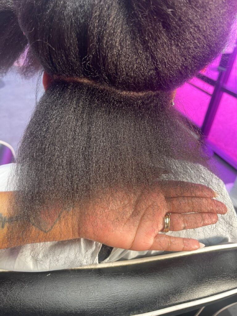 someone with hair breakage as part of the reasons your afro hair isn't growing