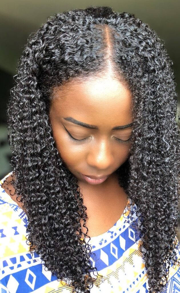 someone moisturized her afro hair under wig