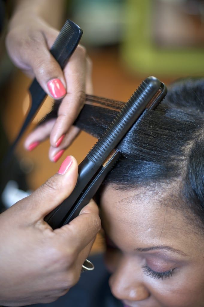 someone getting her hair stretched