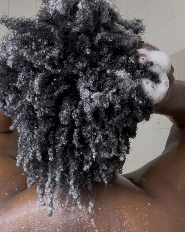 someone washing her hair