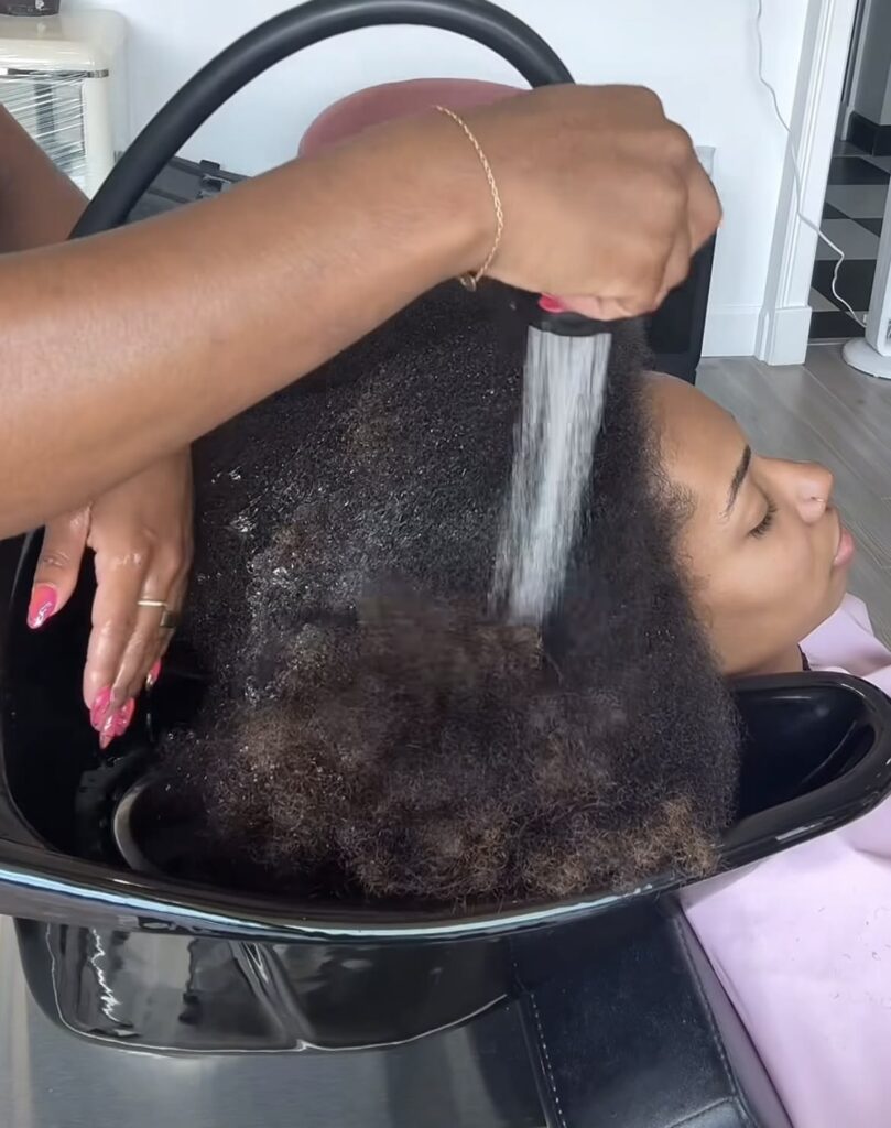 someone getting hair wash service