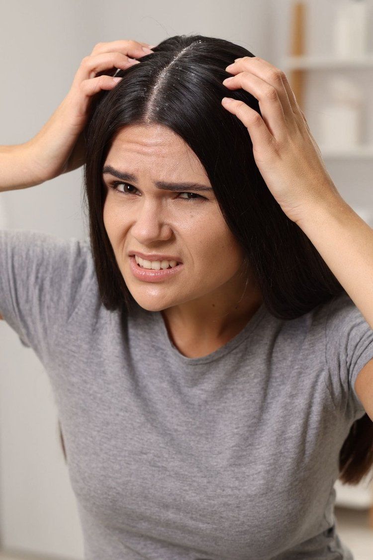 someone with itchy scalp