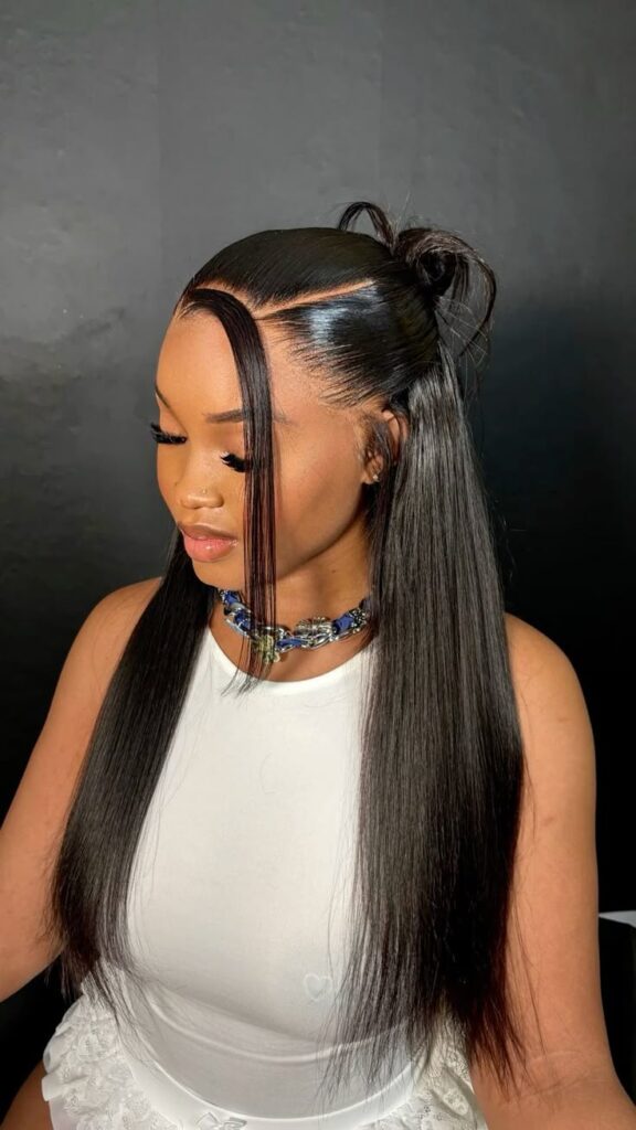 someone with long bone straight wig