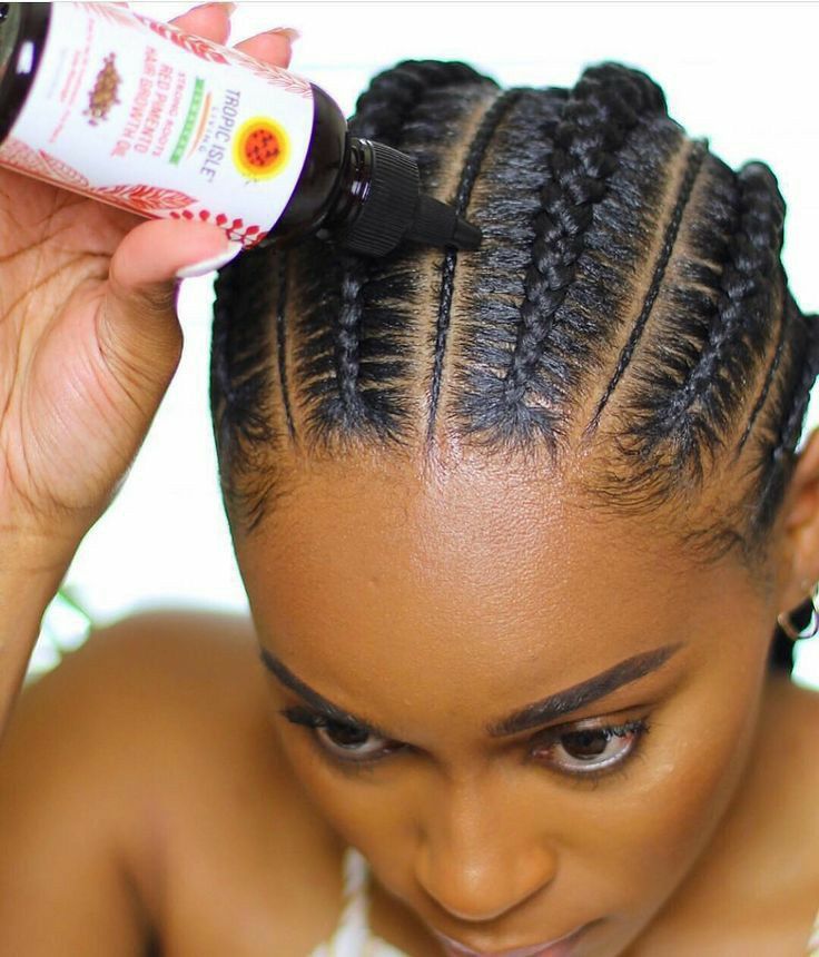 someone that is moisturizing her hai