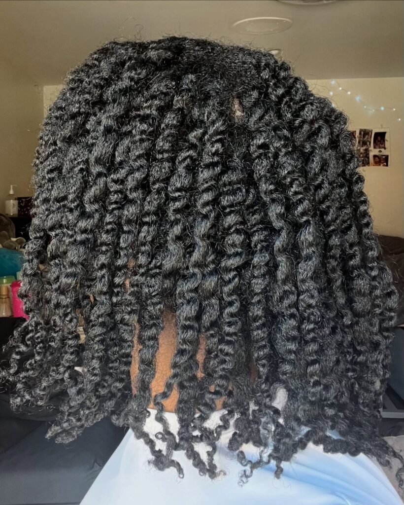 someone with neat afro hair