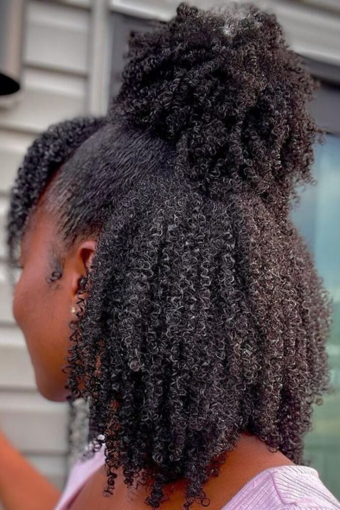 someone with natural hair updo