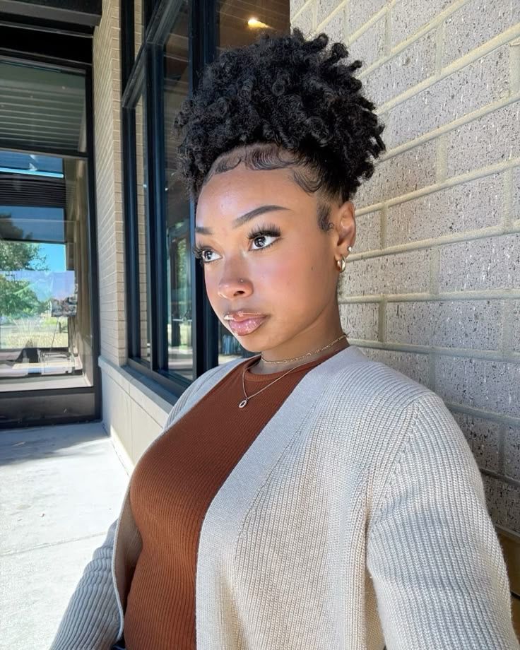 a girl with natural hair with laid edges