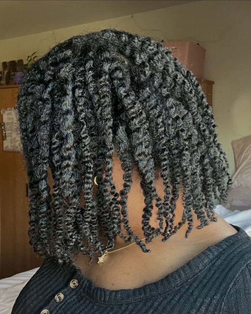 a twist out with neat strands