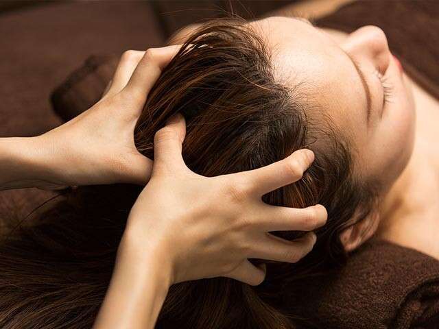 someone getting scalp massage
