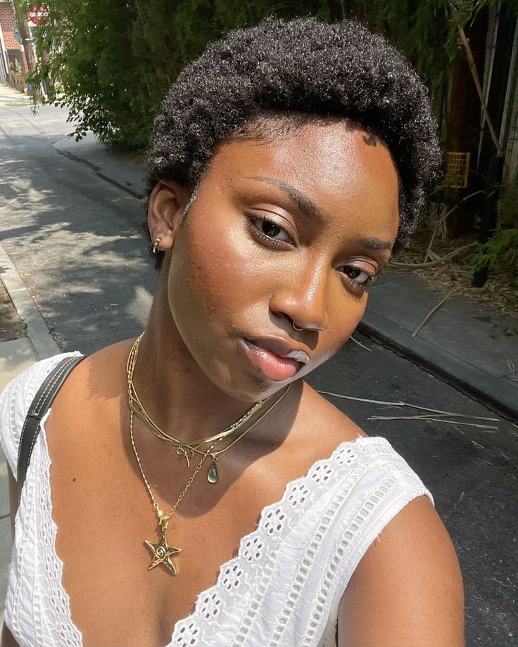 someone with a short afro hair