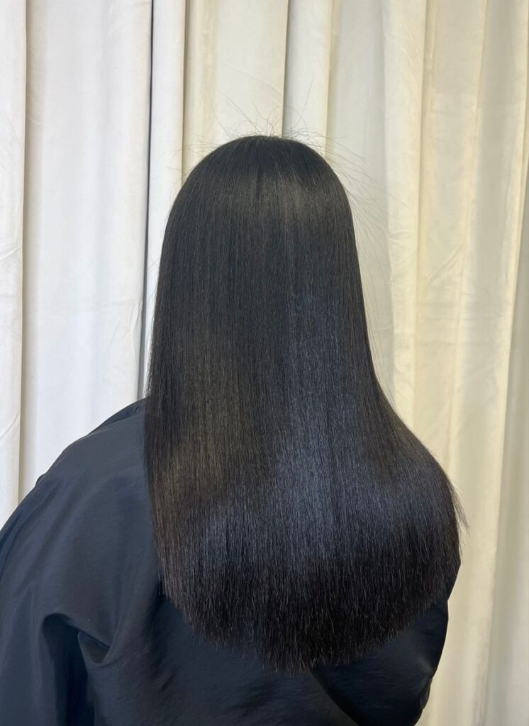 someone that stretched and trimmed her hair