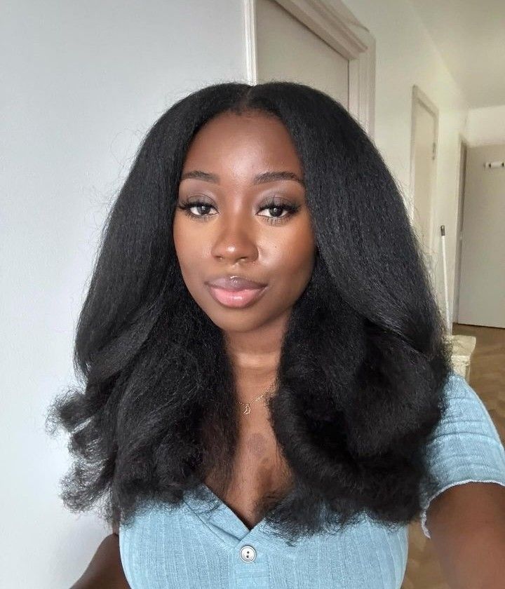 someone with a silk press hair