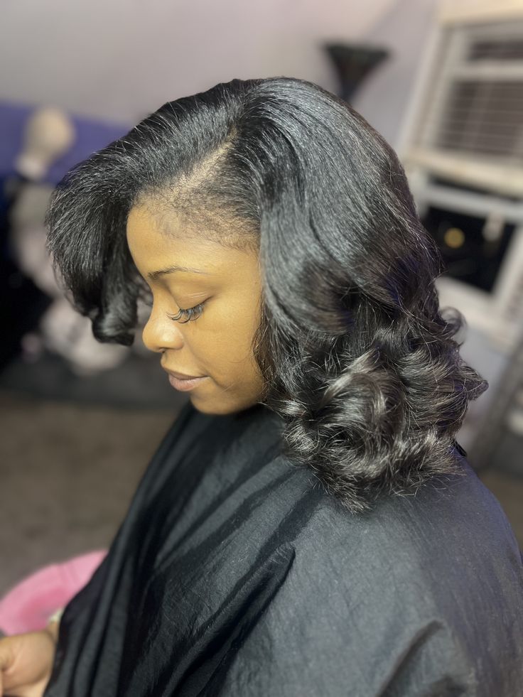 someone showing her silk press hair