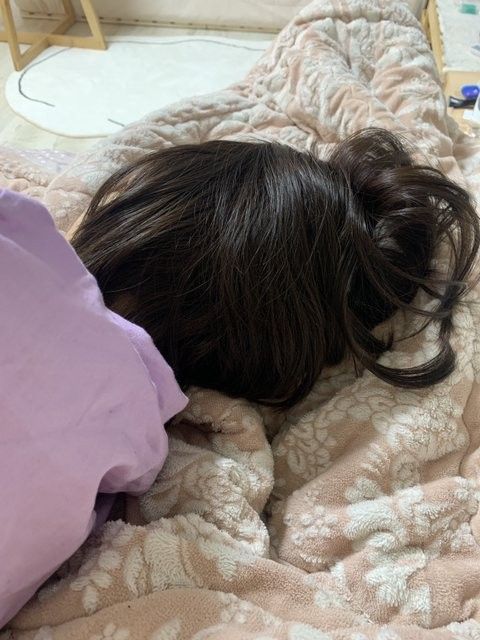 someone sleeping with wig on