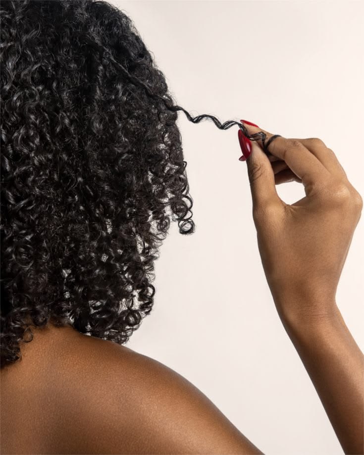 someone with a curly hair