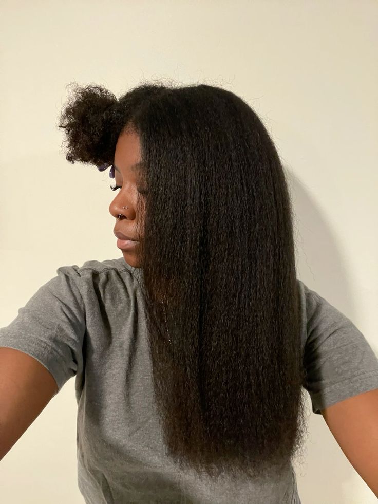 someone showing her half blow out hair