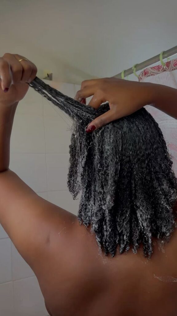 someone washing her hair