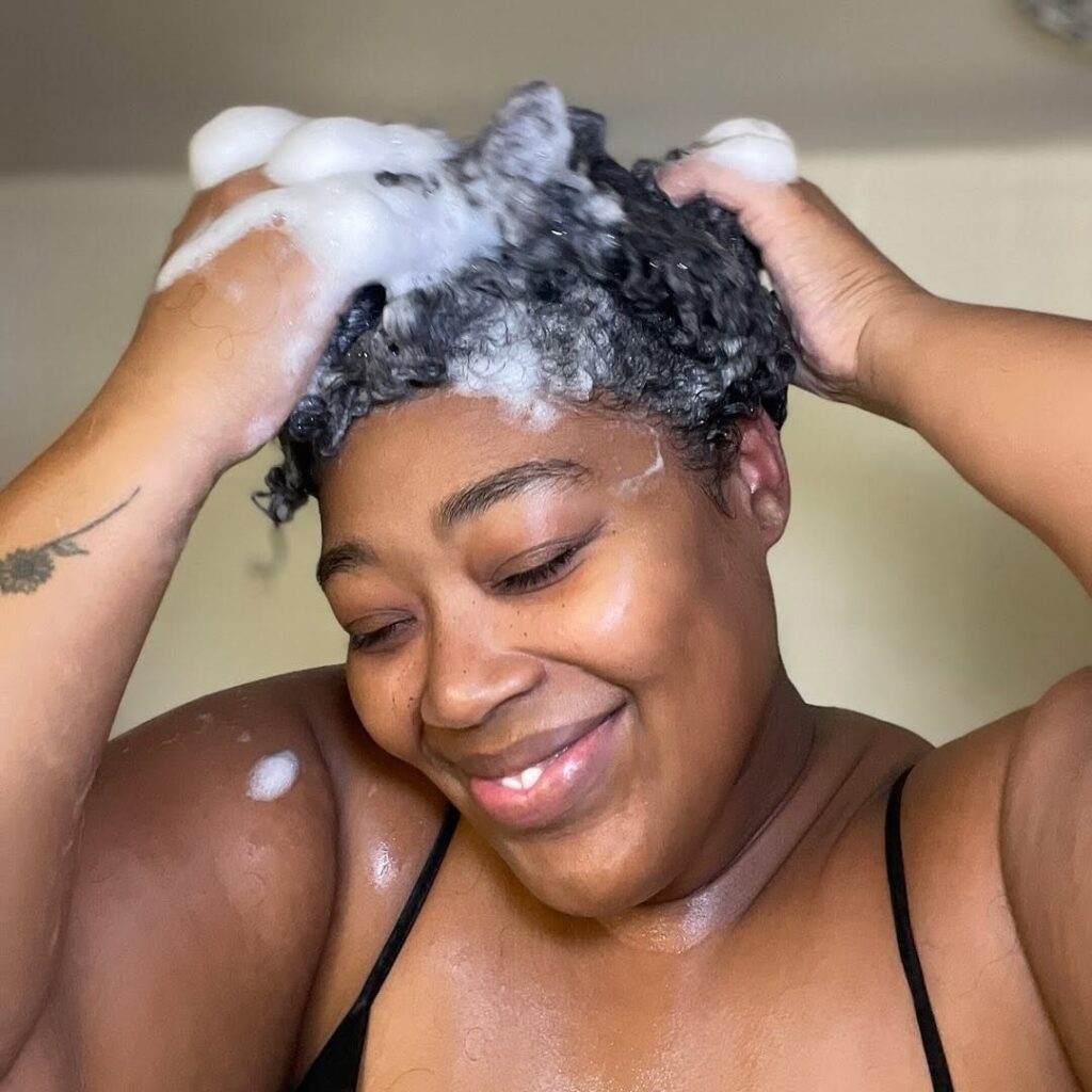 someone washing her hair