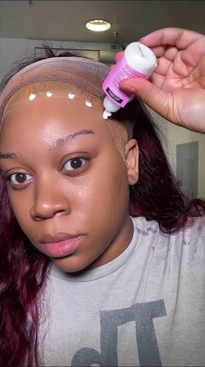 someone installing wig for natural hair