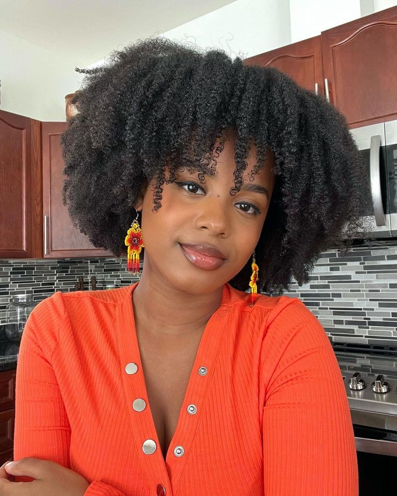 someone with afro bang style