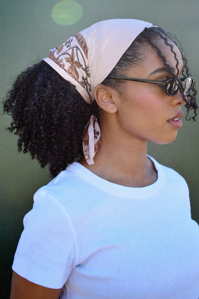 someone with bandana style wrap