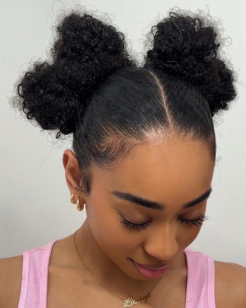someone with bantu knot bun