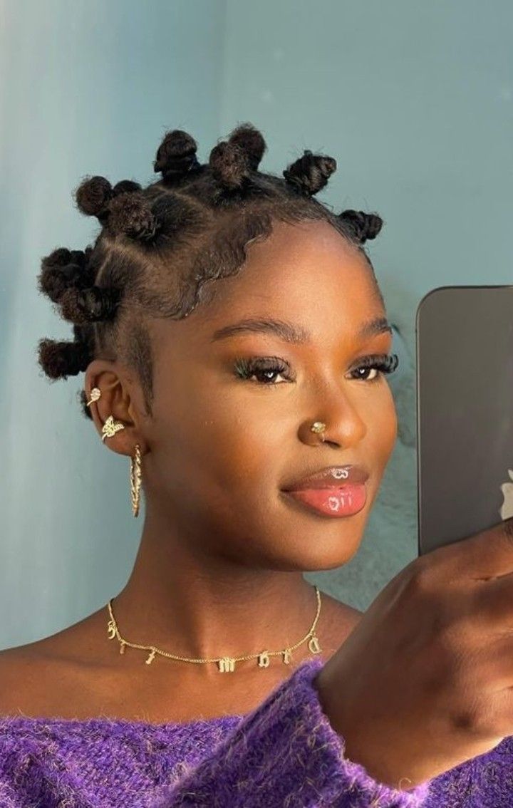 someone with bantu knots