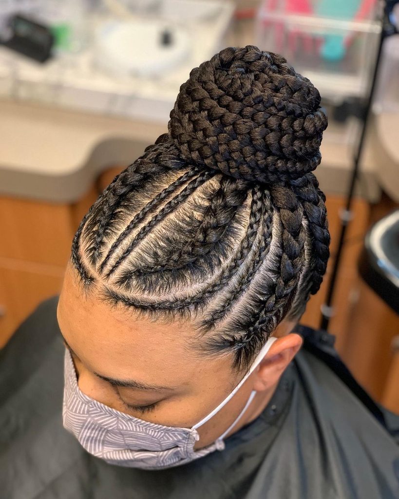 someone with braided updo afro hairstyles